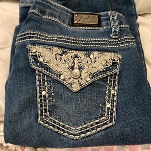 Jeans with stitching and lace on back